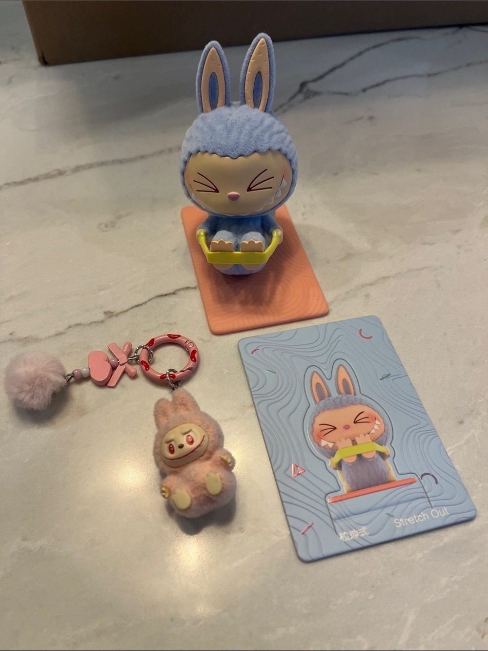 Labubu Lazy Yoga Pop Mart with Pink Keychain and Collectible Card